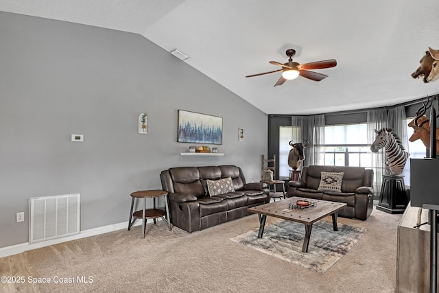 carpeted living room featuring vaulted ceiling and ceiling fan