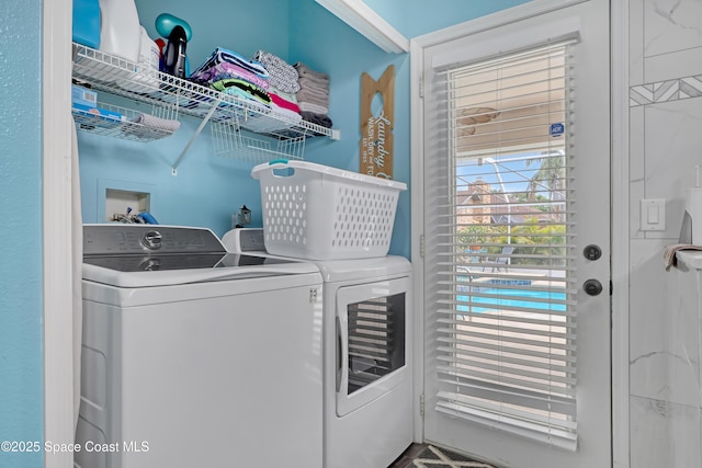 laundry room featuring independent washer and dryer