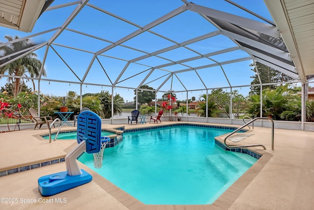 view of pool featuring a lanai and a patio area