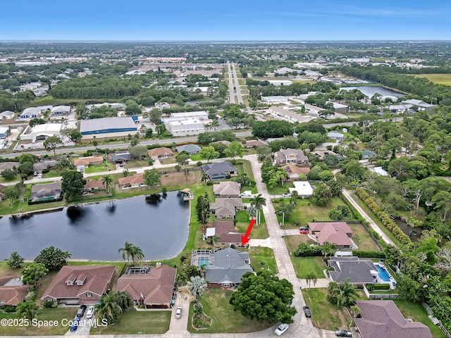 drone / aerial view with a water view