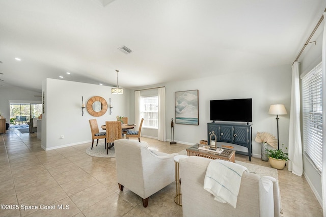 living room with light tile patterned flooring