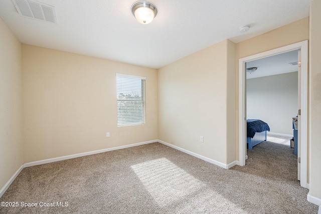 empty room featuring carpet floors