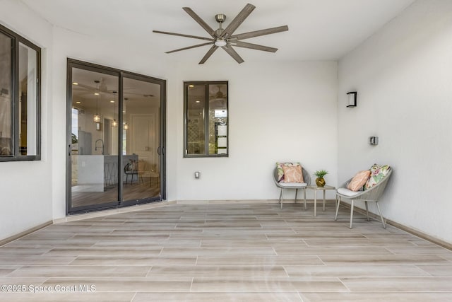 view of patio / terrace with ceiling fan