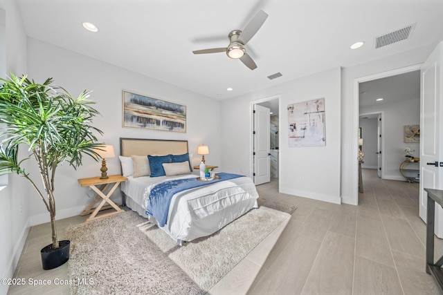 bedroom with ceiling fan and ensuite bathroom