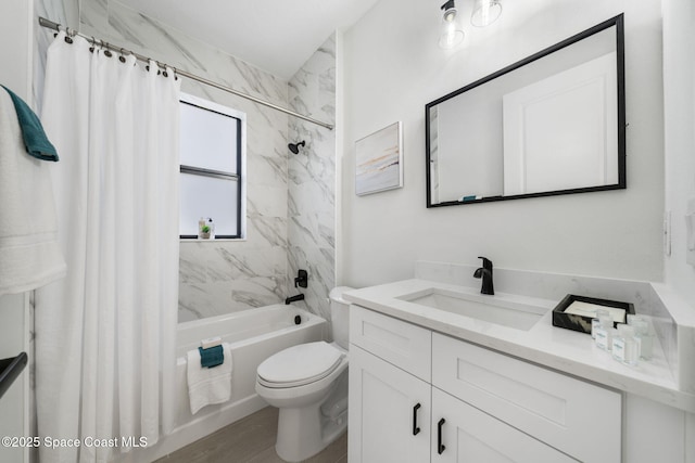 full bathroom with hardwood / wood-style flooring, vanity, shower / tub combo with curtain, and toilet