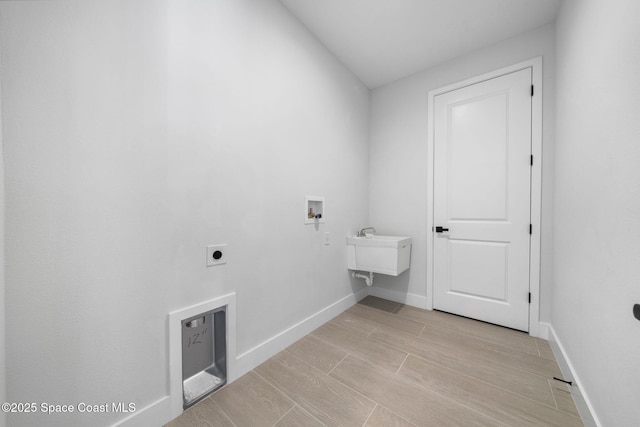 laundry area featuring hookup for a washing machine and electric dryer hookup