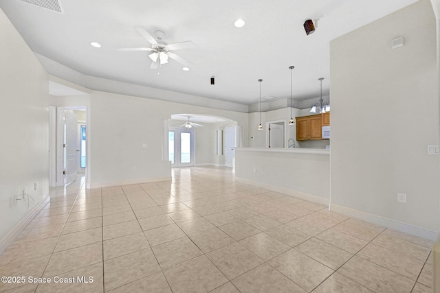 interior space featuring ceiling fan