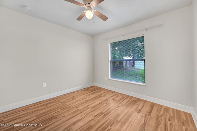 spare room with ceiling fan and light hardwood / wood-style floors