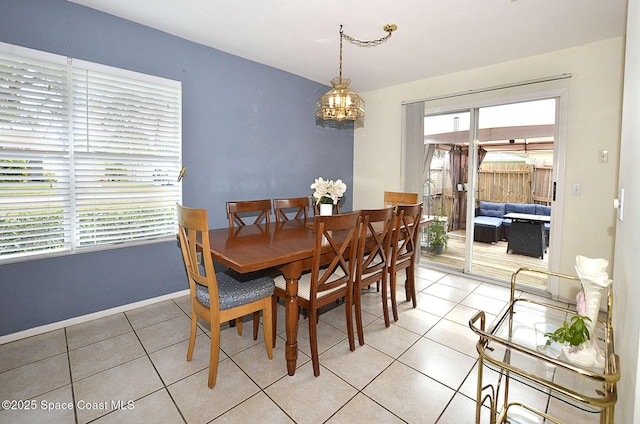 dining area with tile patterned flooring