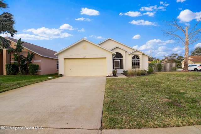 ranch-style house with a garage and a front yard