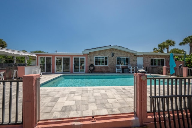 view of pool featuring a patio area