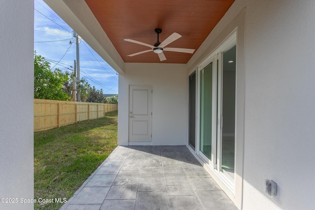 view of patio / terrace featuring ceiling fan