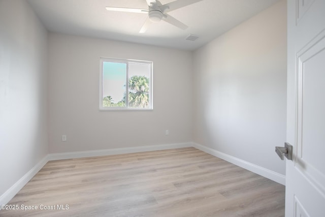 unfurnished room featuring ceiling fan and light wood-type flooring