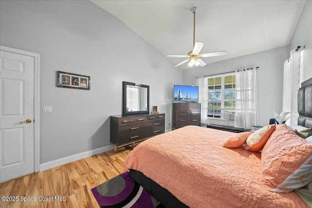 bedroom with lofted ceiling, wood-type flooring, and ceiling fan