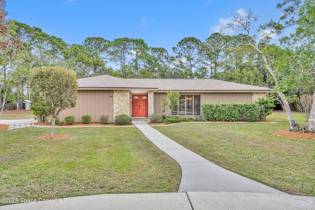 ranch-style home with a front yard