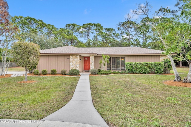 ranch-style home with a front yard