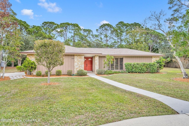 single story home with a front yard