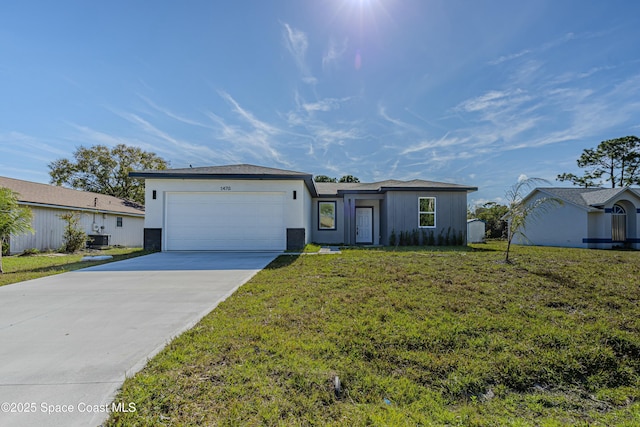 single story home featuring a garage, a front yard, and cooling unit