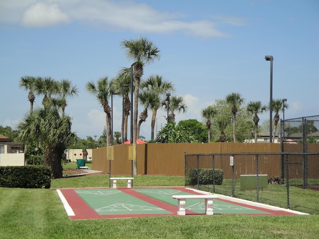 view of community featuring a lawn