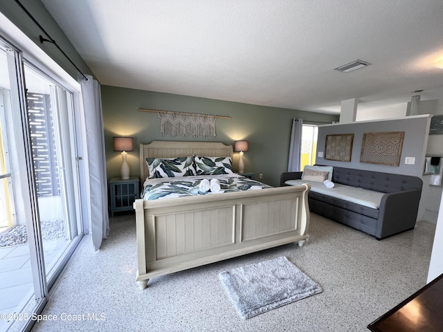 bedroom with a textured ceiling