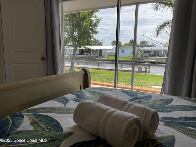 bedroom with a water view