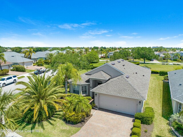 7105 Mendell Way, Melbourne, FL 32940 - drone / aerial view featuring a residential view