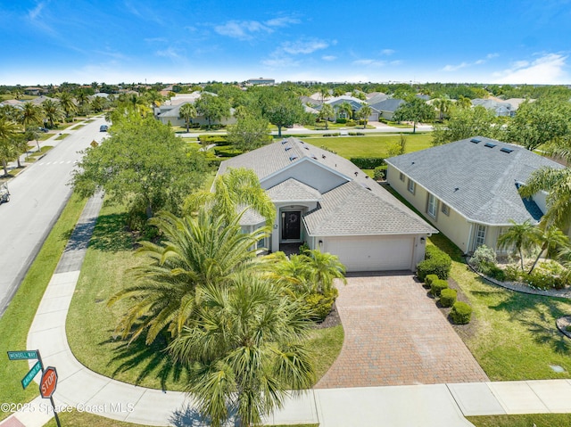 7105 Mendell Way, Melbourne, FL 32940 - drone / aerial view with a residential view