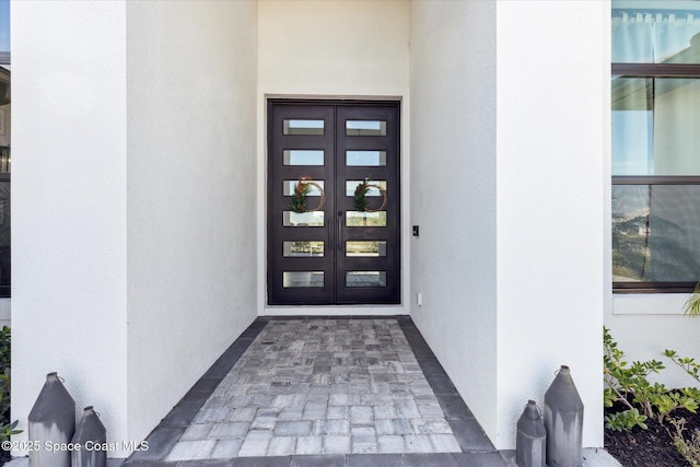 property entrance with french doors