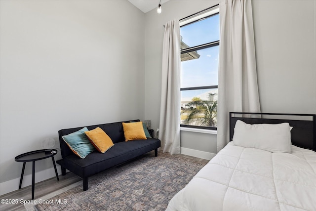 bedroom featuring hardwood / wood-style flooring