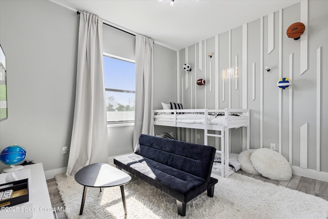 bedroom featuring hardwood / wood-style floors