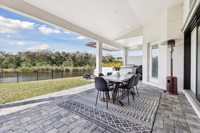 view of patio / terrace with a water view