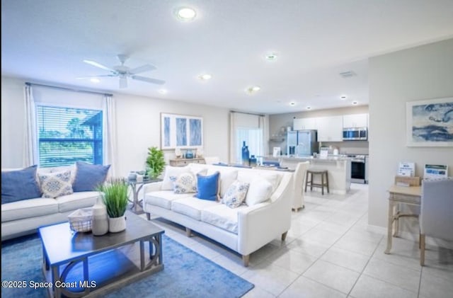 living room with light tile patterned flooring