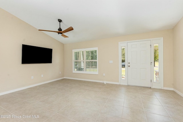 tiled foyer entrance featuring vaulted ceiling and ceiling fan