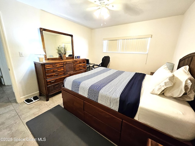 bedroom with light tile patterned flooring and ceiling fan