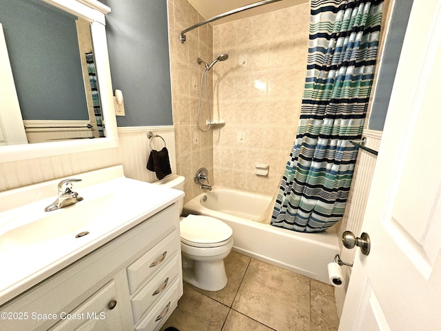 full bathroom with tile patterned flooring, vanity, shower / bath combination with curtain, and toilet