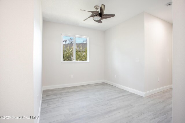 unfurnished room featuring ceiling fan and light hardwood / wood-style floors