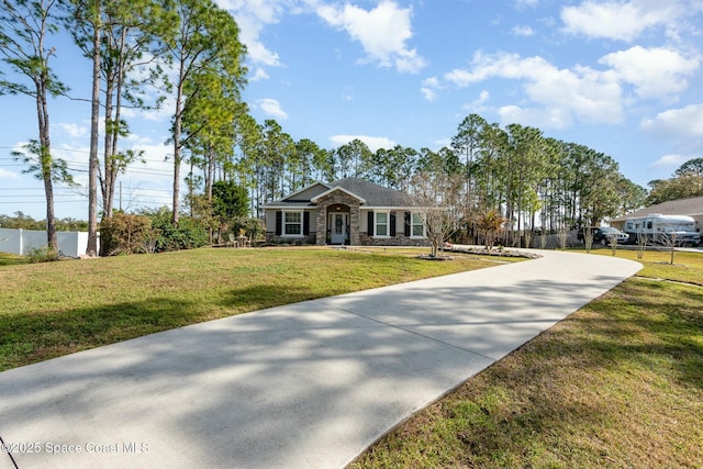 single story home with a front yard