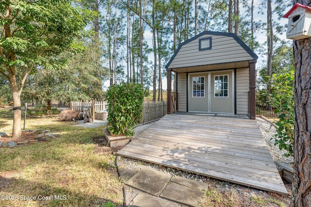 deck with an outdoor structure