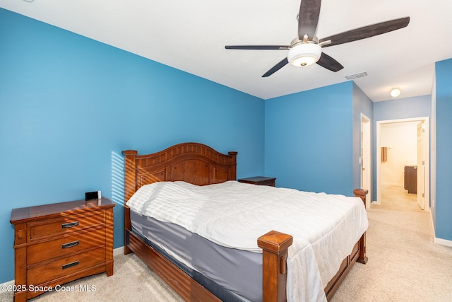 bedroom featuring light carpet and ceiling fan