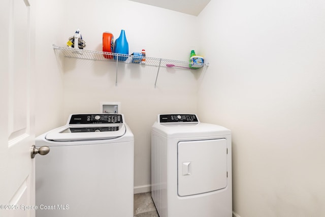 laundry area with washer and dryer