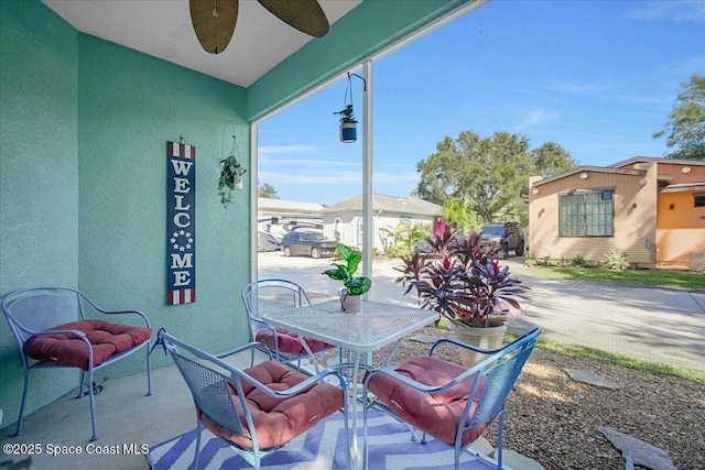 view of patio / terrace featuring ceiling fan