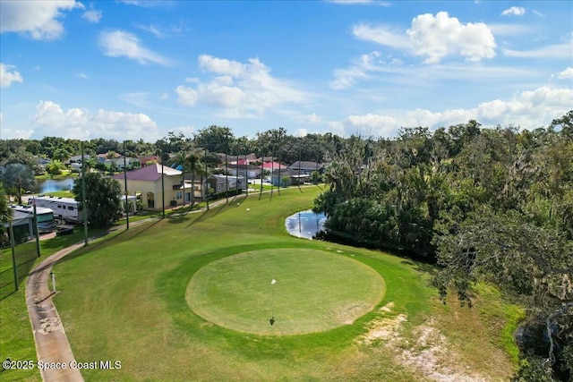 surrounding community featuring a water view