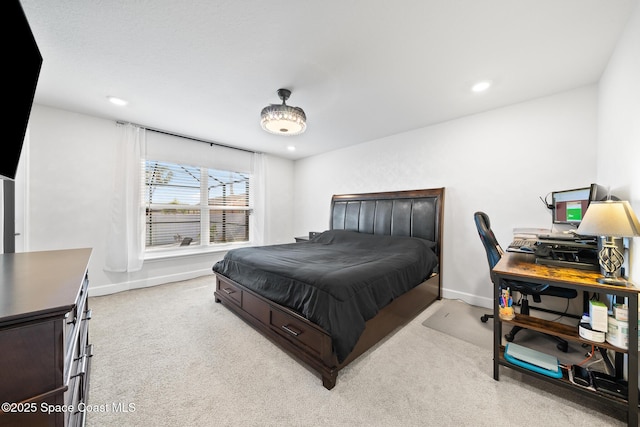 bedroom with light colored carpet