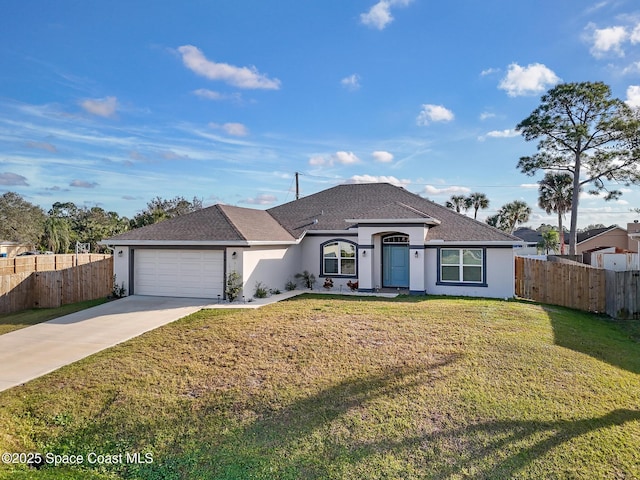 ranch-style house featuring a garage and a front yard