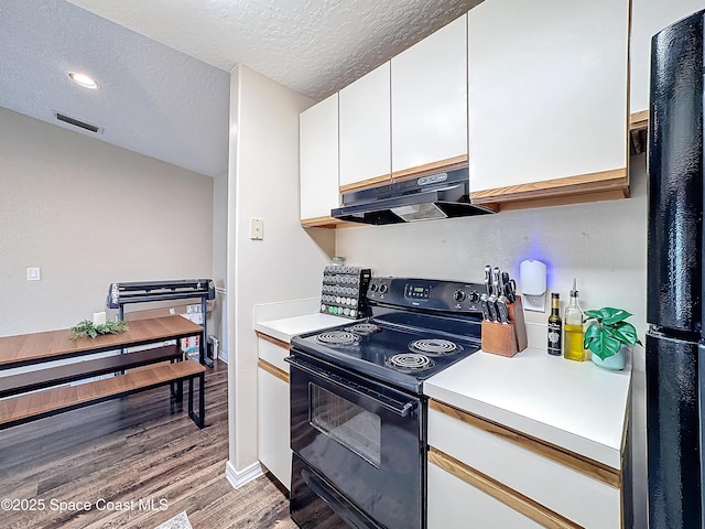 kitchen featuring a textured ceiling, white cabinets, light hardwood / wood-style floors, and black appliances