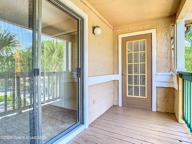 7667 N Wickham Rd Unit 721, Melbourne, FL 32940 - doorway to property with stucco siding