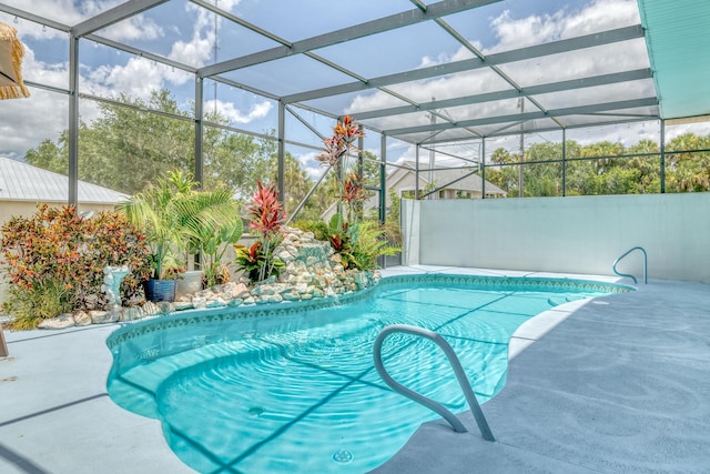 view of pool featuring a lanai and a patio area