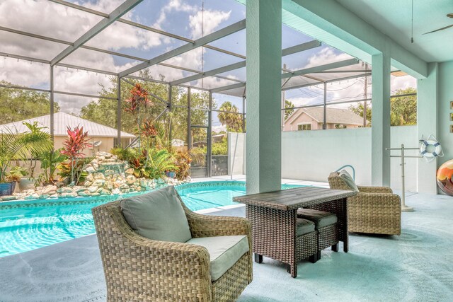 view of patio / terrace featuring a fenced in pool and a lanai