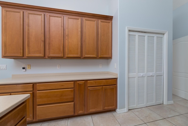 kitchen with light tile patterned floors