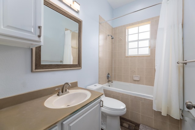 full bathroom with vanity, toilet, and shower / bath combo